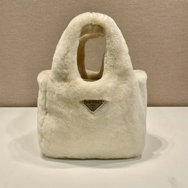 프라다 에크루 시어링 미니 토트백