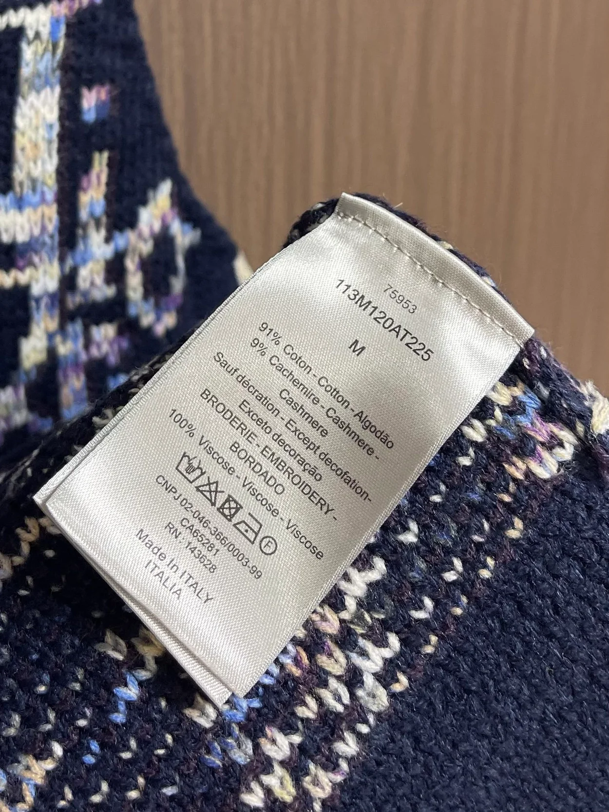 디올 오블리크 민소매 니트