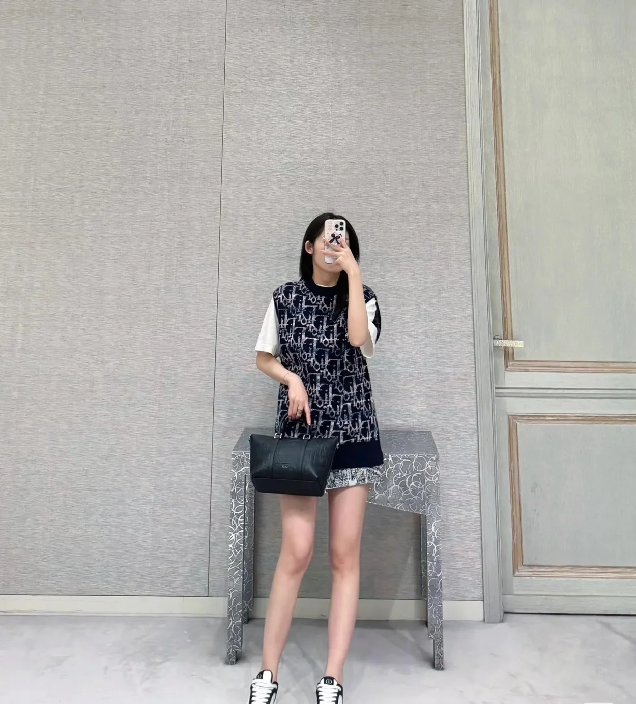 디올 오블리크 민소매 니트