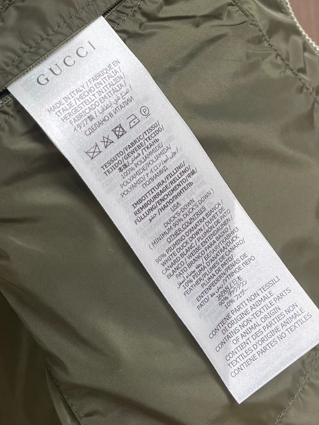 구찌 점보 GG 캔버스 다운 베스트