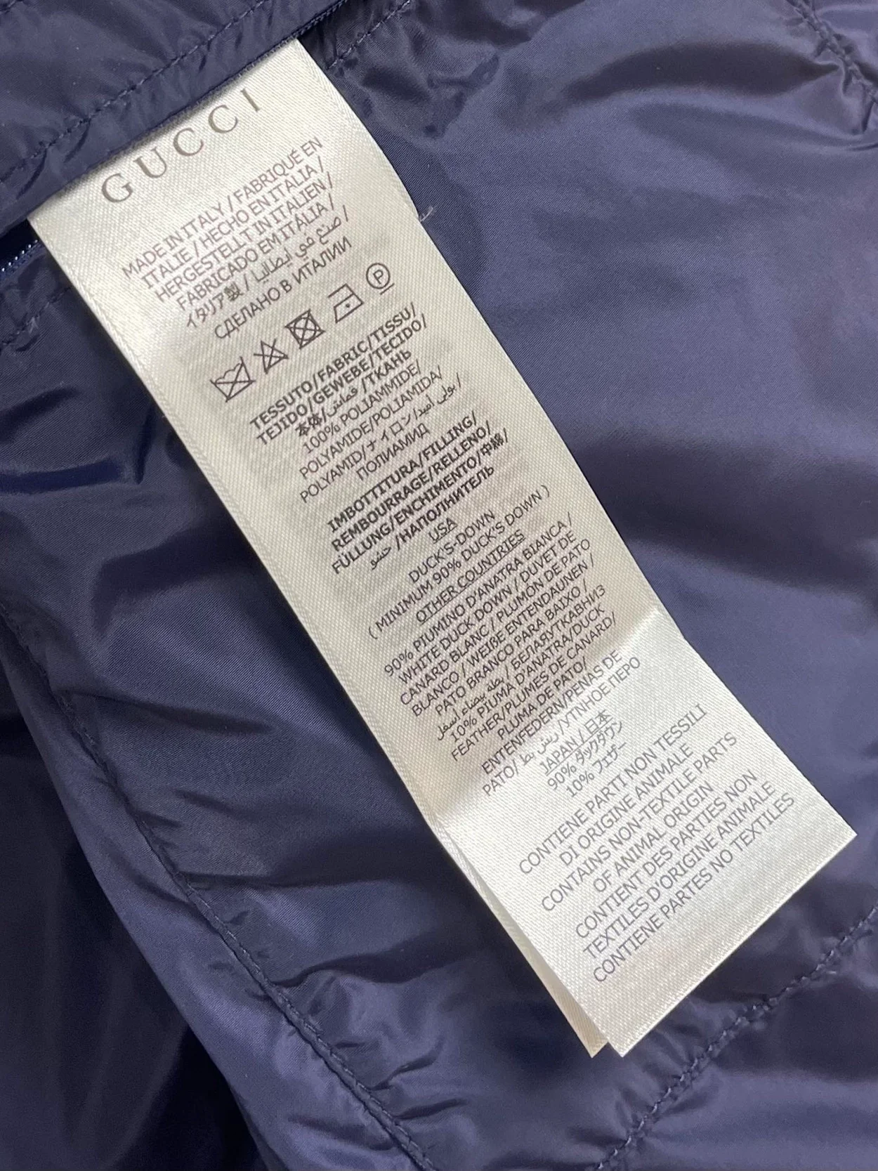 구찌 점보 GG 캔버스 다운 베스트