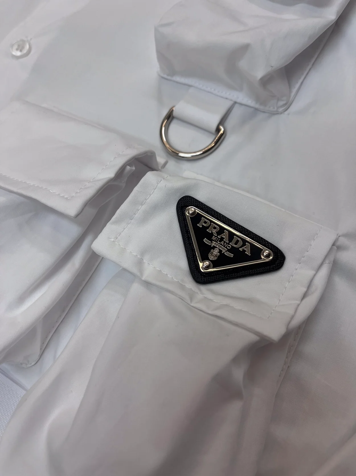 프라다 리포터 매그넘 셔츠