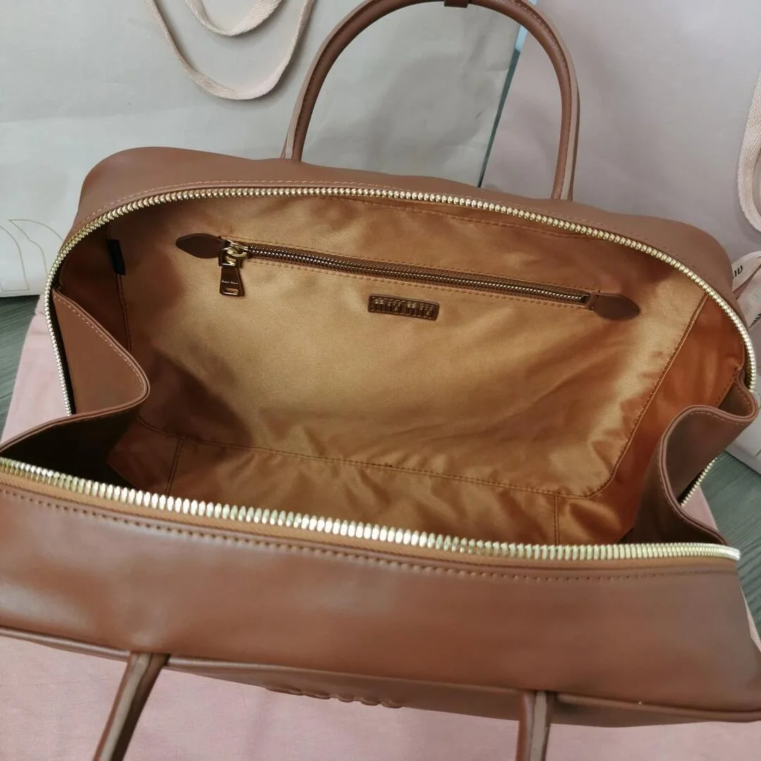 미우미우 가죽 탑 핸들백 브라운