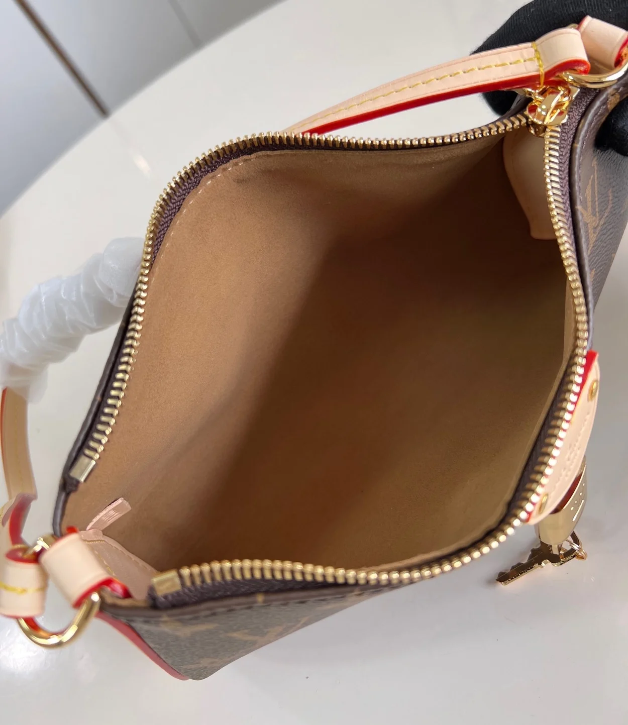 루이비통 포쉐트 티레트 백 M47123