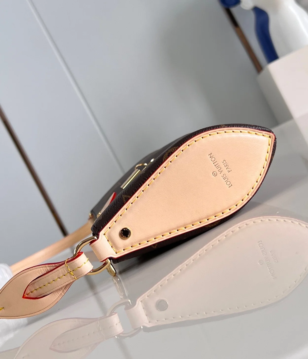 루이비통 포쉐트 티레트 백 M47123