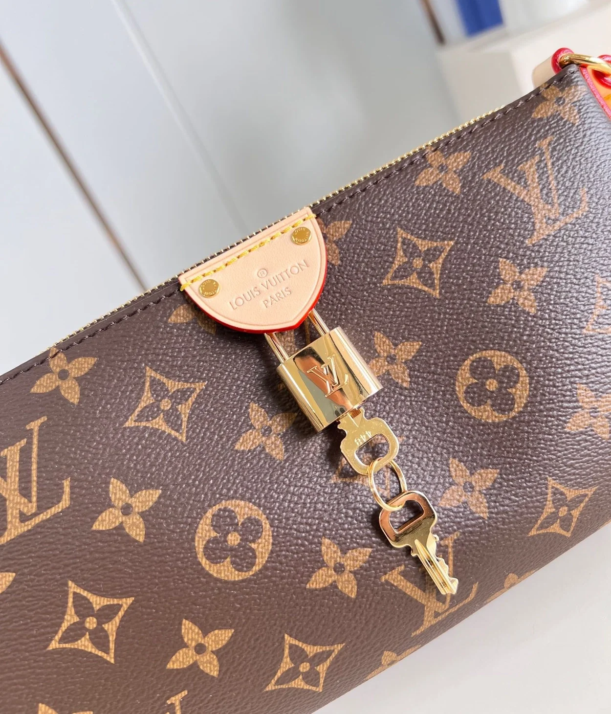 루이비통 포쉐트 티레트 백 M47123