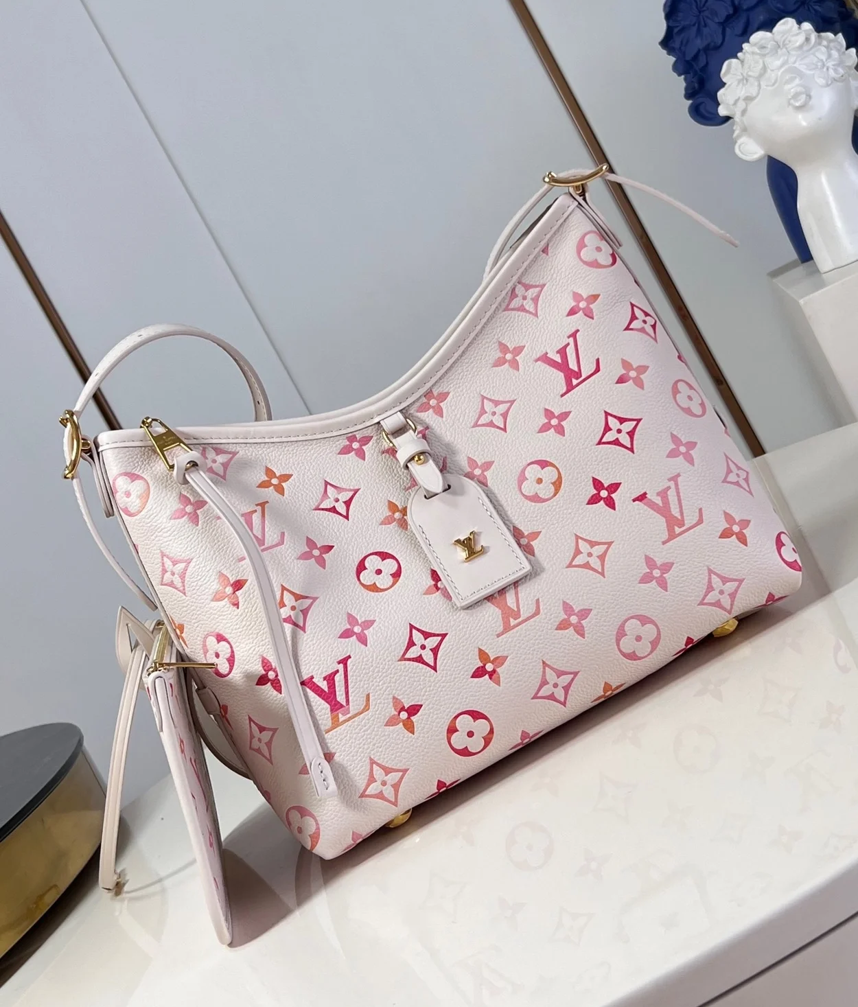 루이비통 캐리올 PM 모노그램 선라이즈 M24652