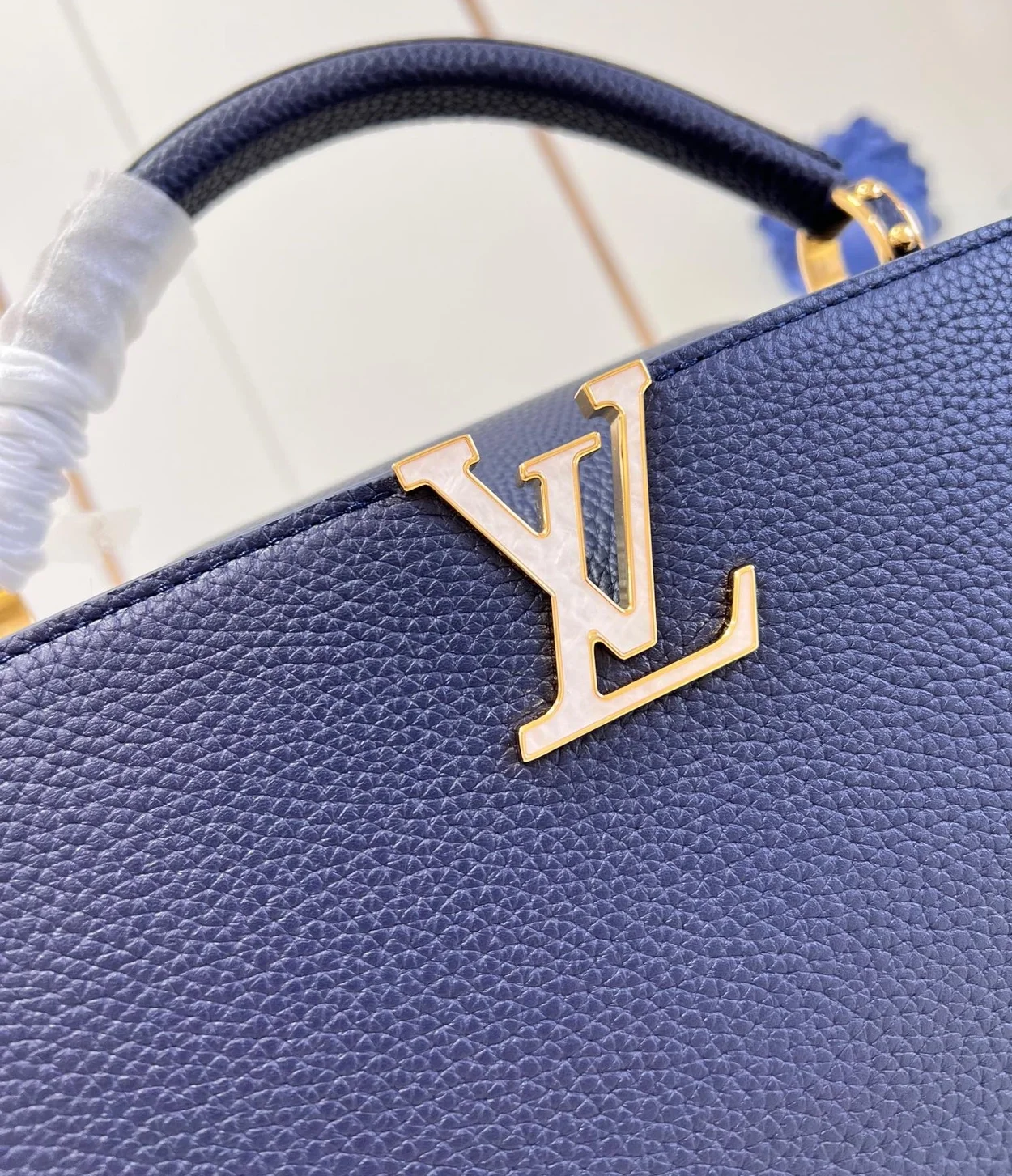 루이비통 카퓌신 MM M21150