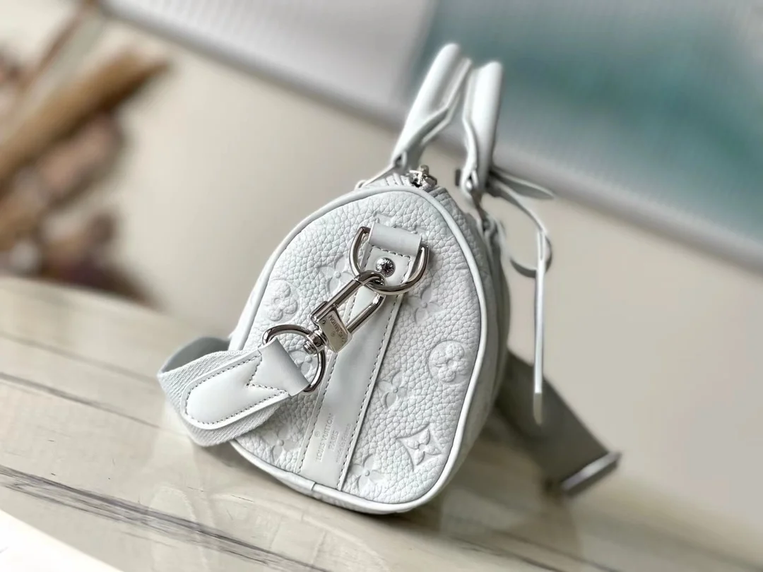 루이비통 키폴 반둘리에 25 토리옹 M23163