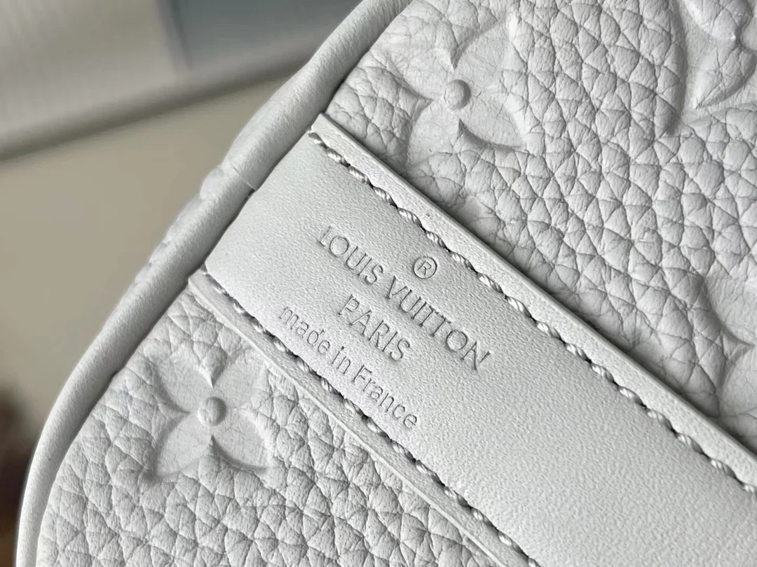 루이비통 키폴 반둘리에 25 토리옹 M23163