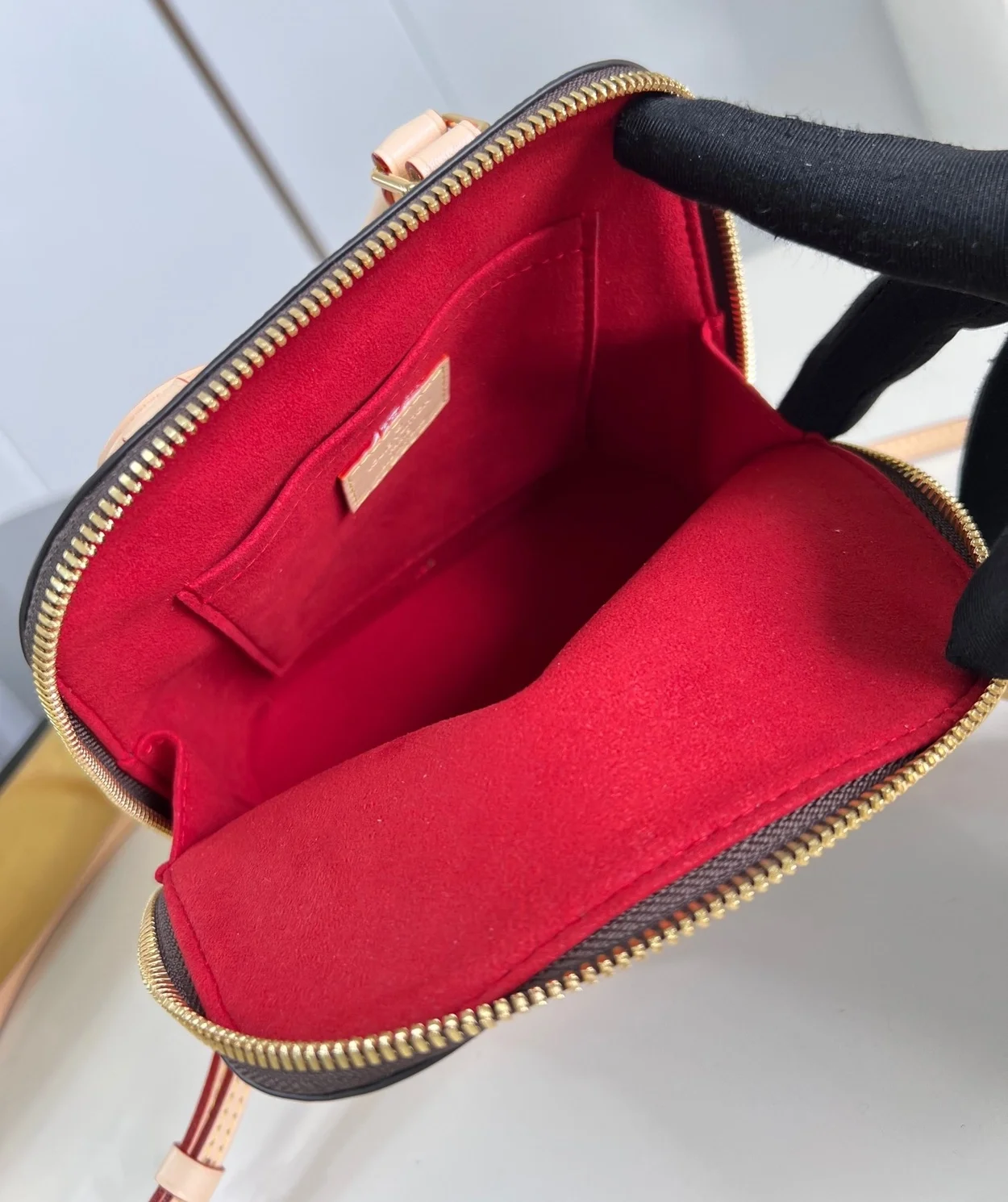 루이비통 알마 백팩 M47132