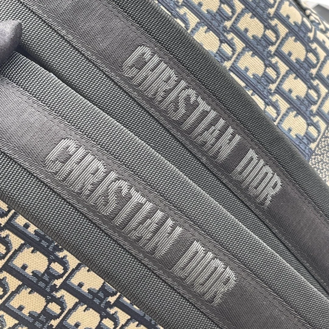 디올 오블리크 자카드 트래블 백팩 블루