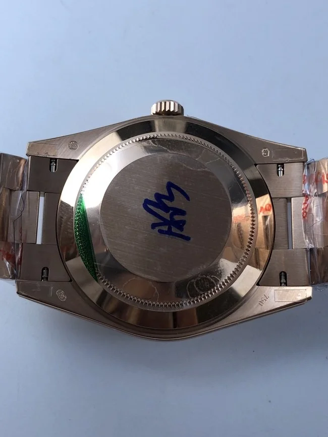 롤렉스 데이데이트 40mm 로즈골드 그린 로만 인덱스