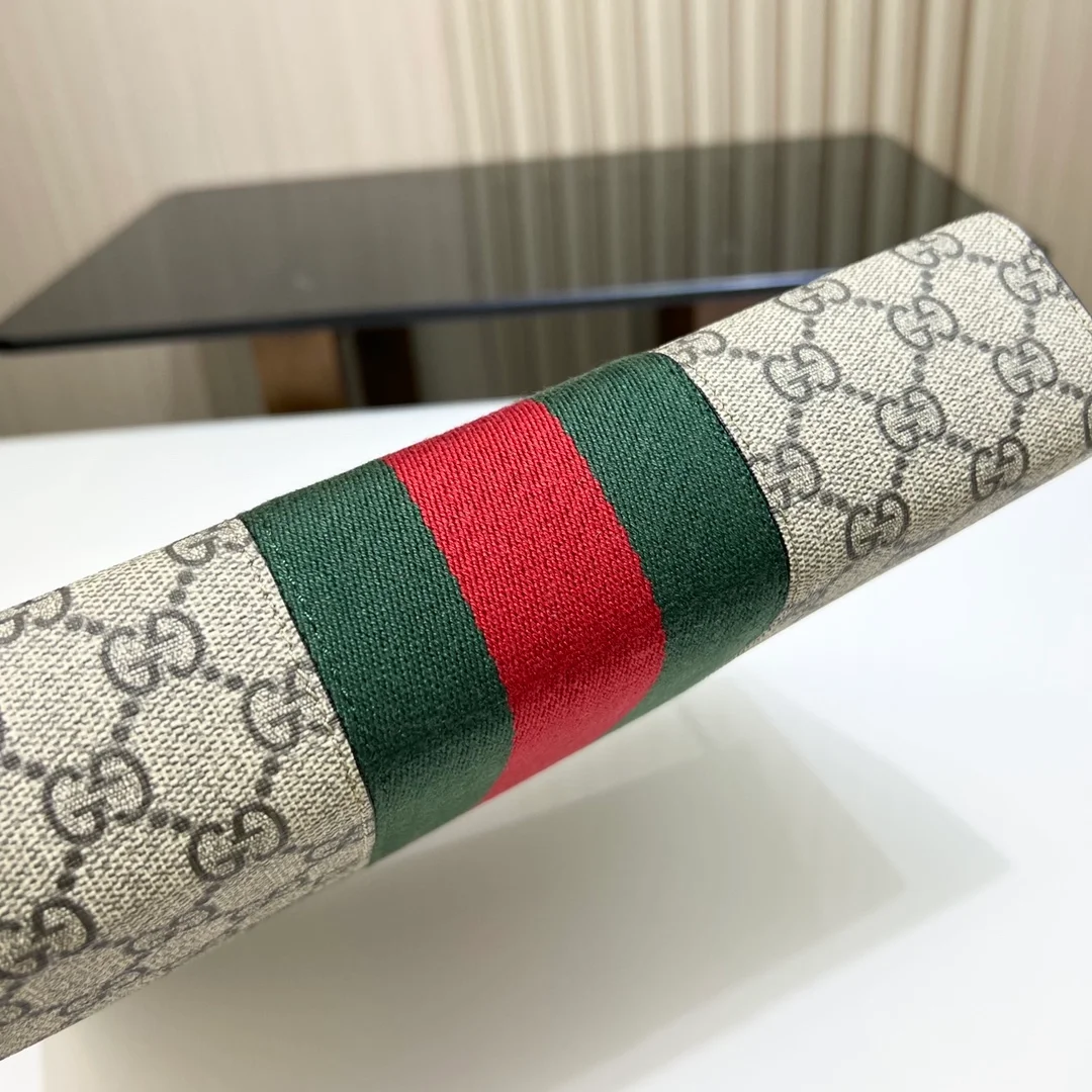 구찌 GG 삼선 웹 슈프림 클러치백