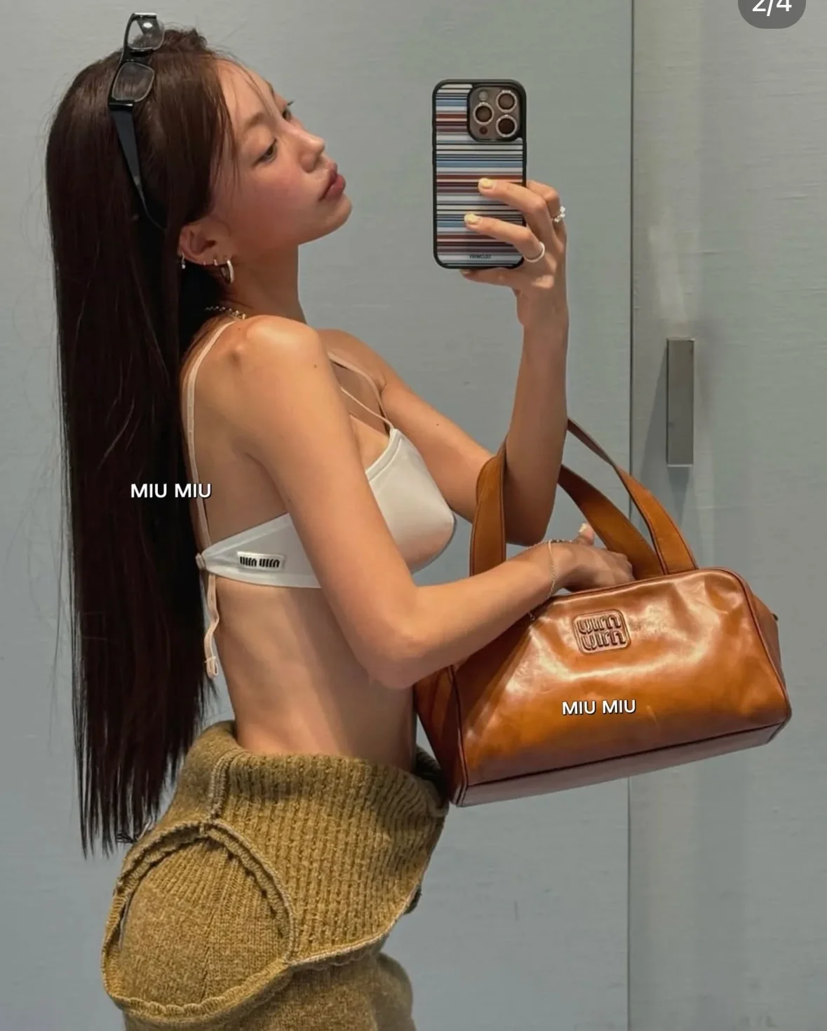 미우미우 25FW 레더 탑 핸들 5BB182