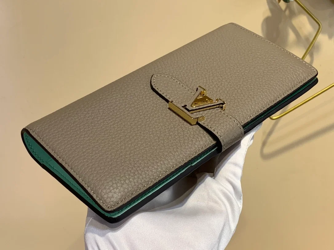 루이비통 토뤼옹 버티컬 월릿 M81367