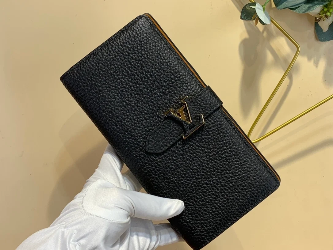 루이비통 토뤼옹 버티컬 월릿 M81330