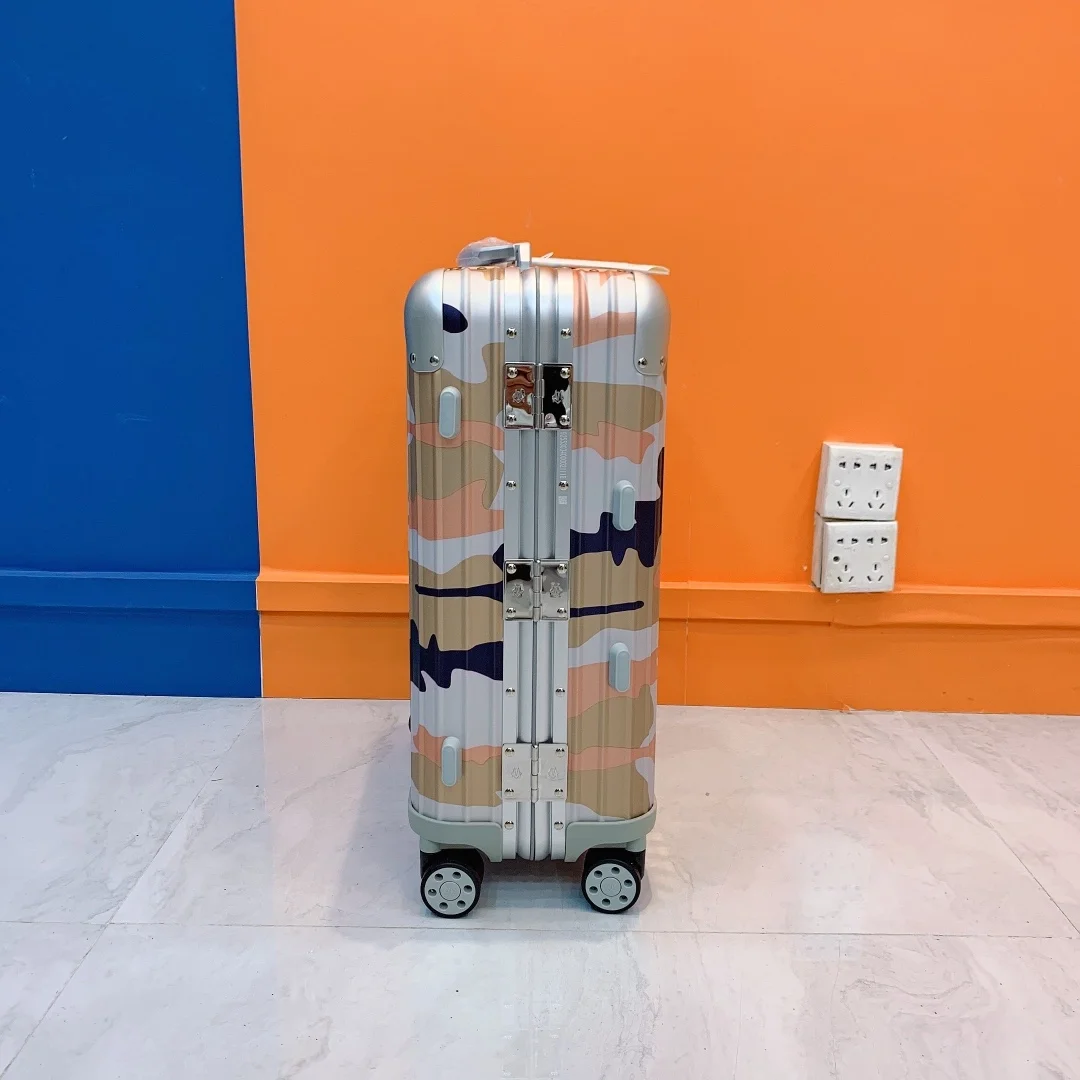 리모와 오리지널 캐빈 카모 수트케이스 오렌지