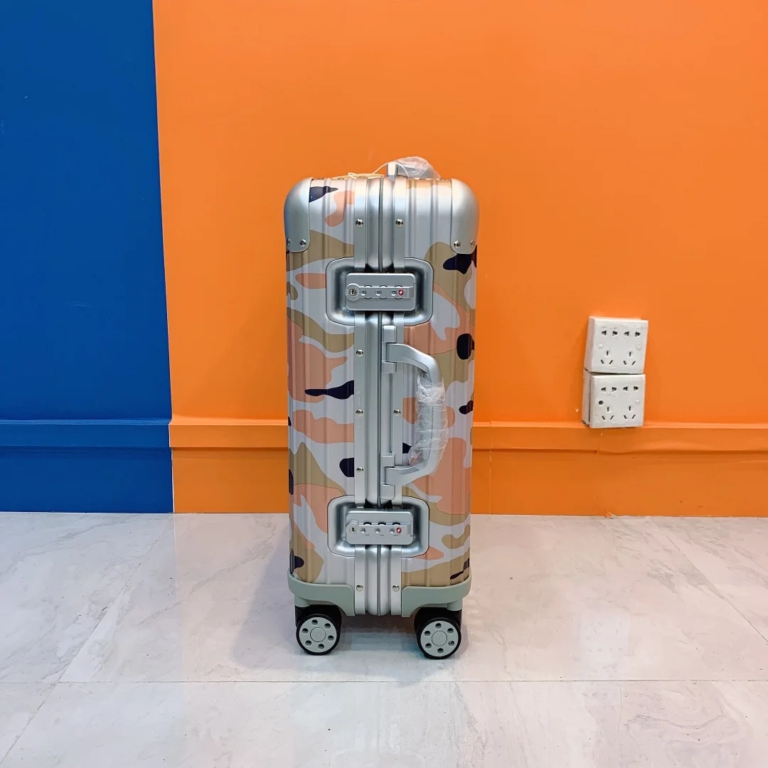 리모와 오리지널 캐빈 카모 수트케이스 오렌지