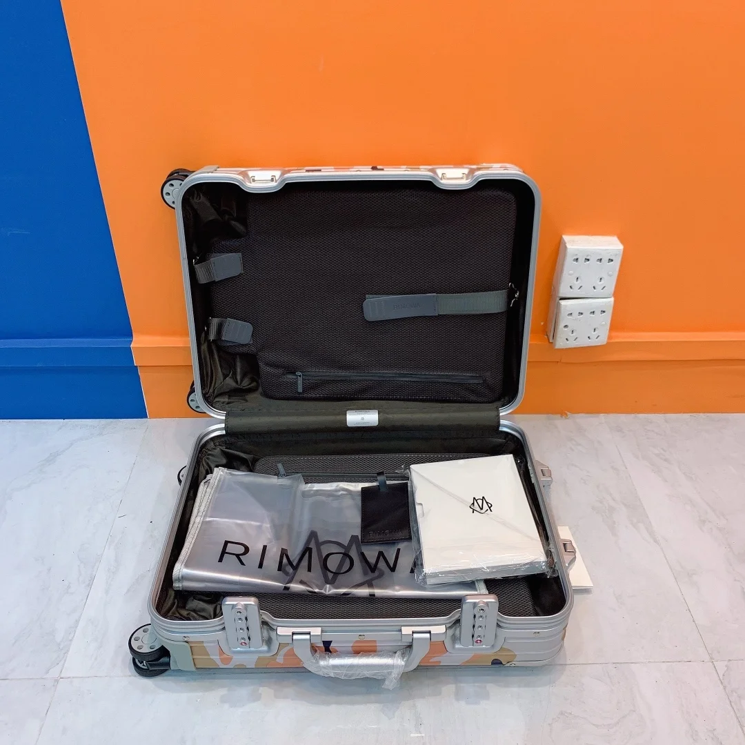 리모와 오리지널 캐빈 카모 수트케이스 오렌지