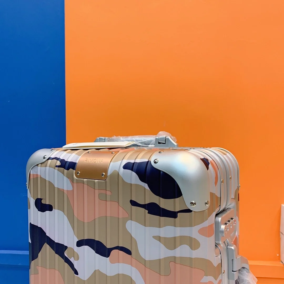 리모와 오리지널 캐빈 카모 수트케이스 오렌지