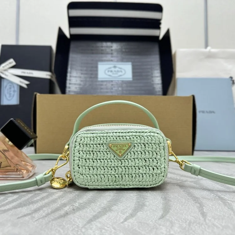 프라다 우븐 원단 및 가죽 미니 파우치 1NR025