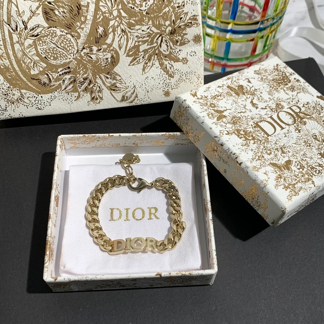 디올 레볼루션 골드 피니시 메탈 팔지