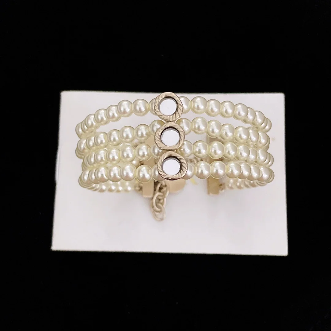 디올 라 파리지앵 화이트 펄 팔찌