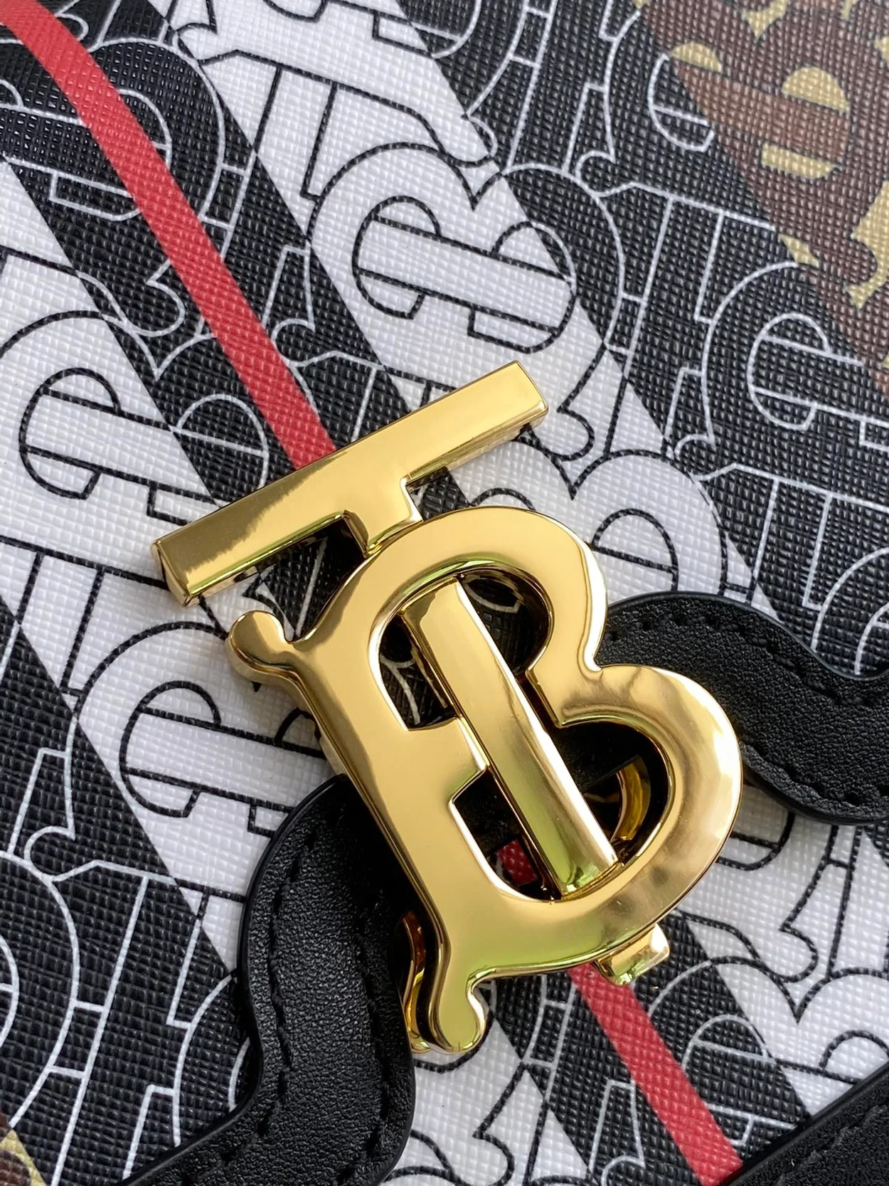 버버리 모노그램 스트라이프 E 캔버스백