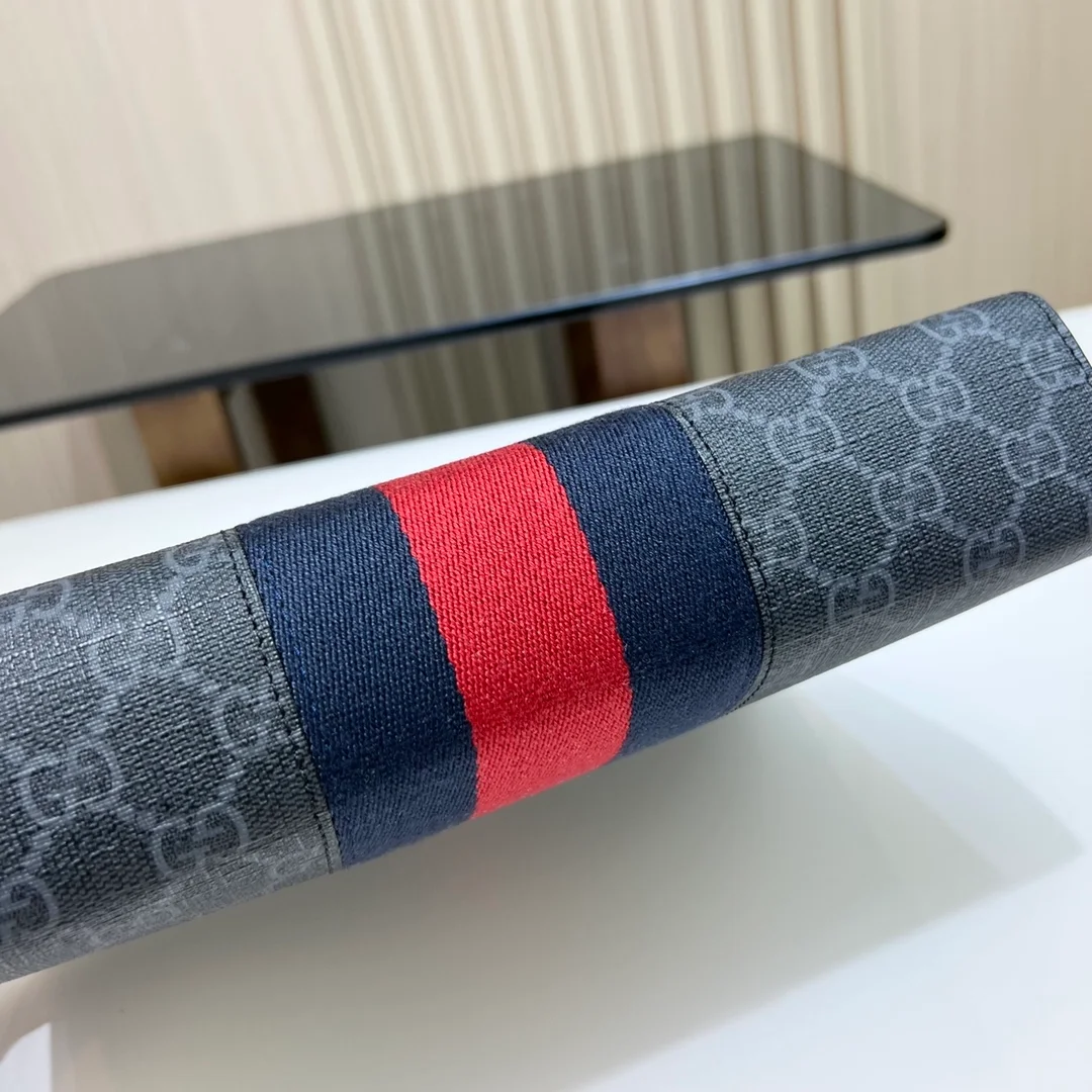 구찌 GG 수프림 캔버스 웹 파우치