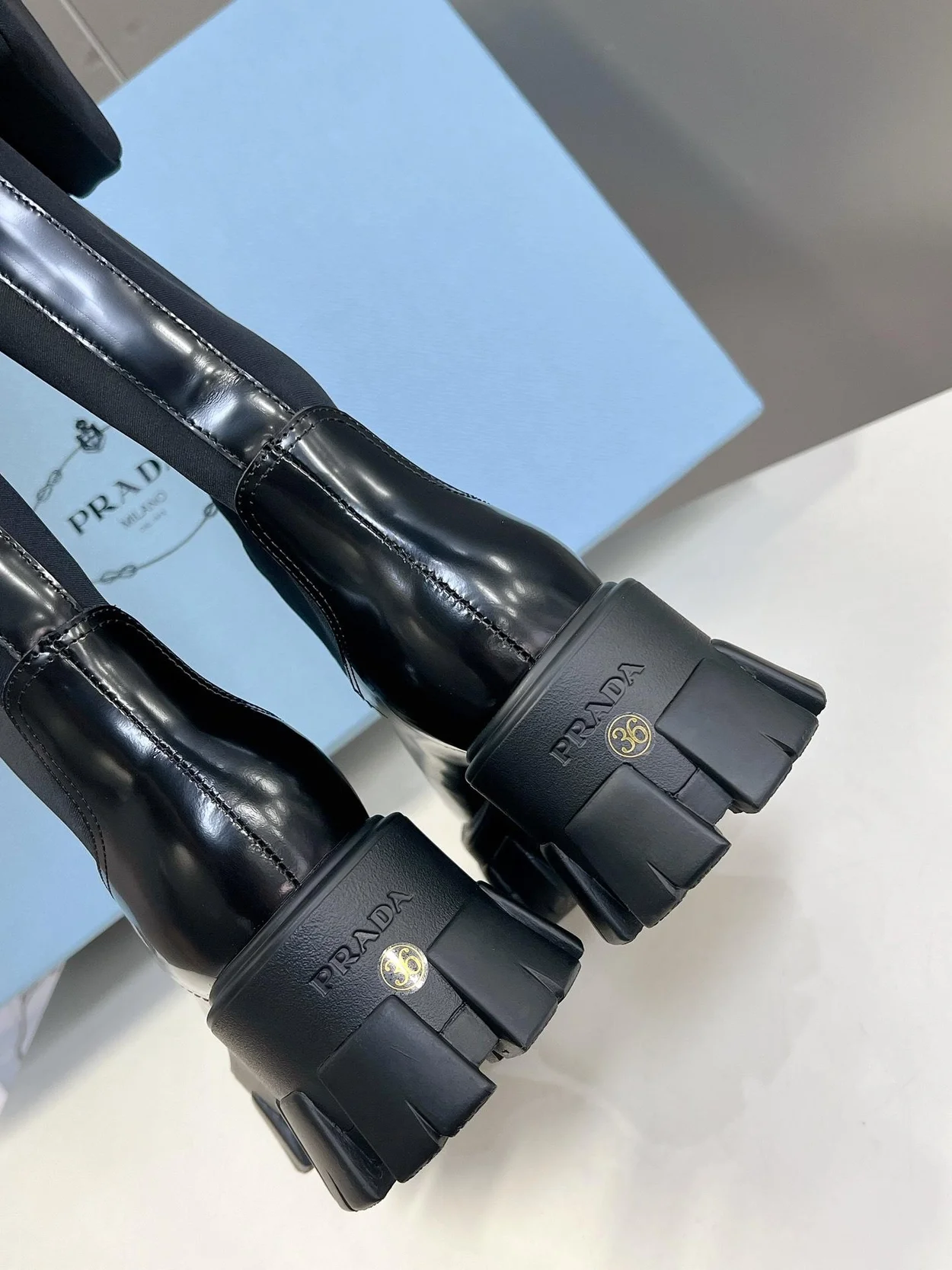 프라다 리나일론 개버딘 및 가죽 플랫폼 부츠