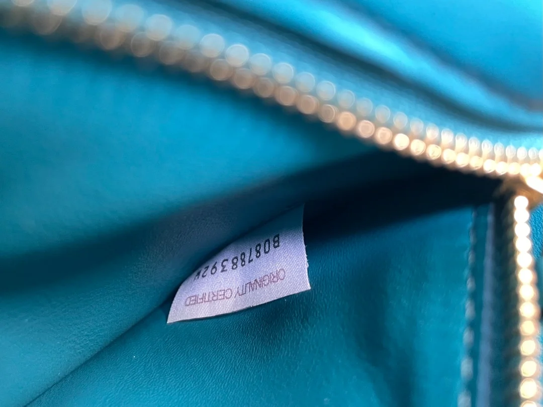 보테가 베네타 인트레치아토 램스킨 크로스백 블래스터